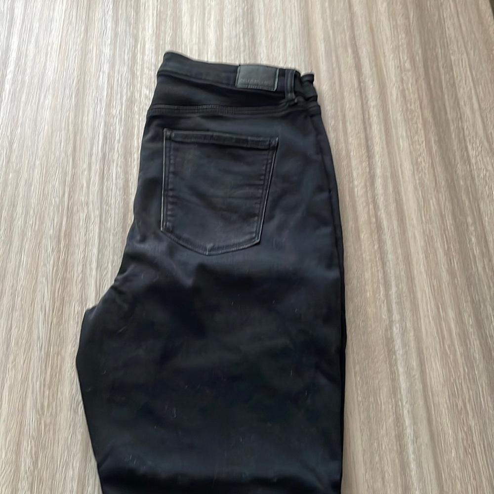 American Eagle Next Level Stretch black skinny jeans with mock holes